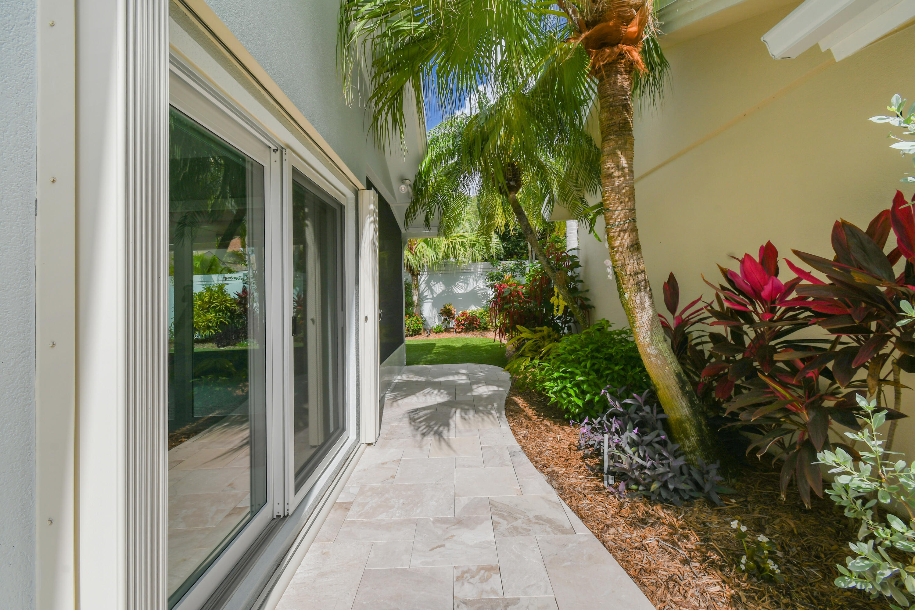 438 River Edge Road Jupiter, FL 33477 - Photo 59 of 80 Side Pavers to Yard