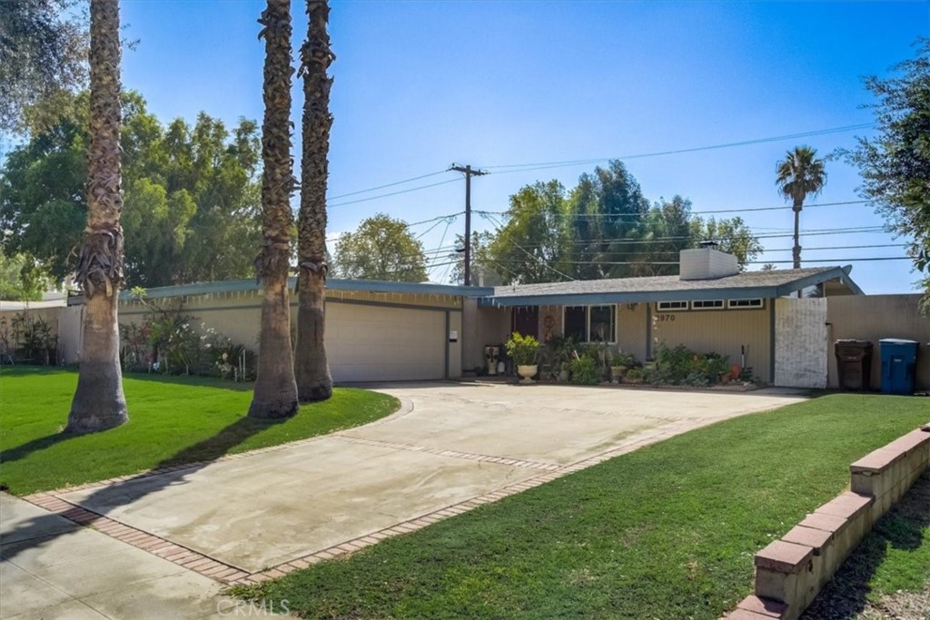 2970 Priscilla Street Riverside, CA 92506 - Photo 1 of 1 a front view of a house with garden