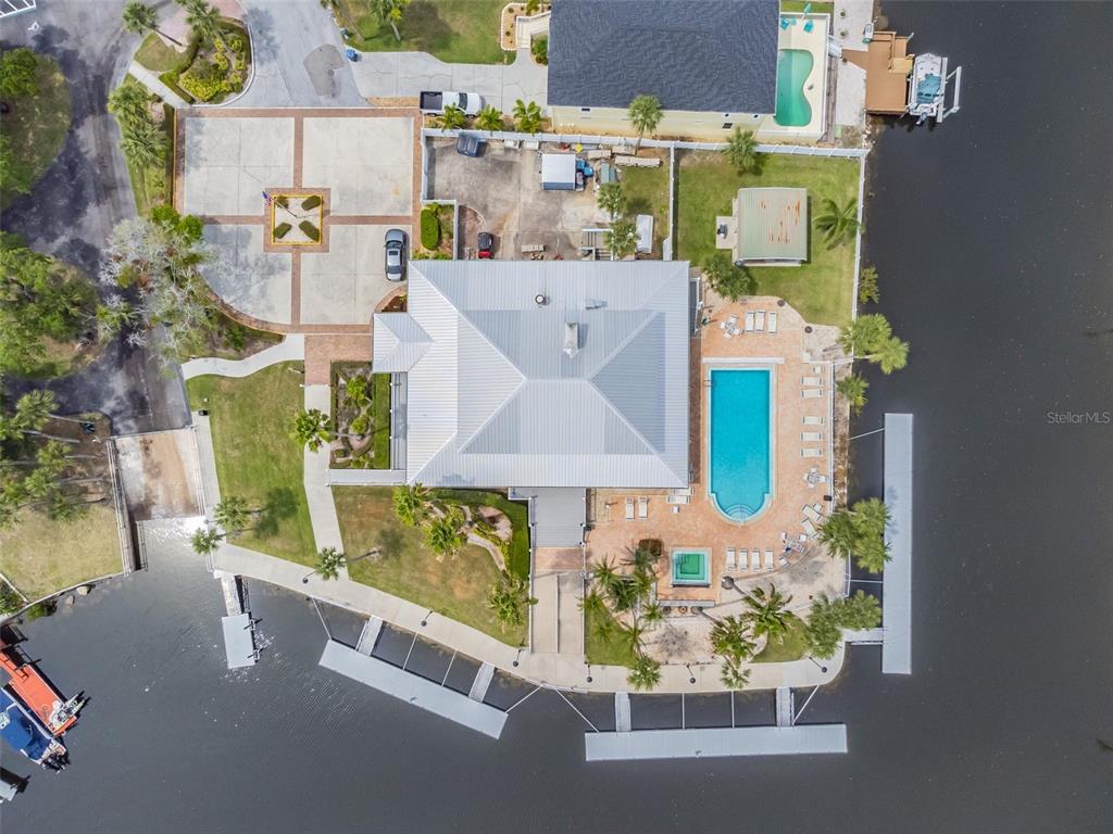 6241 Bayside Drive New Port Richey, FL 34652 - Photo 73 of 78 an aerial view of a house with a swimming pool