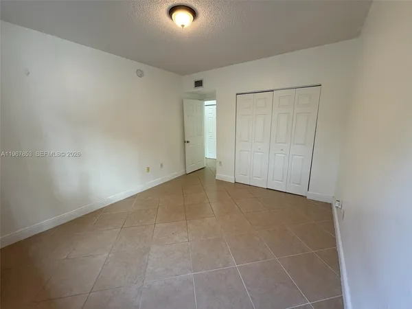 an empty room with an entryway