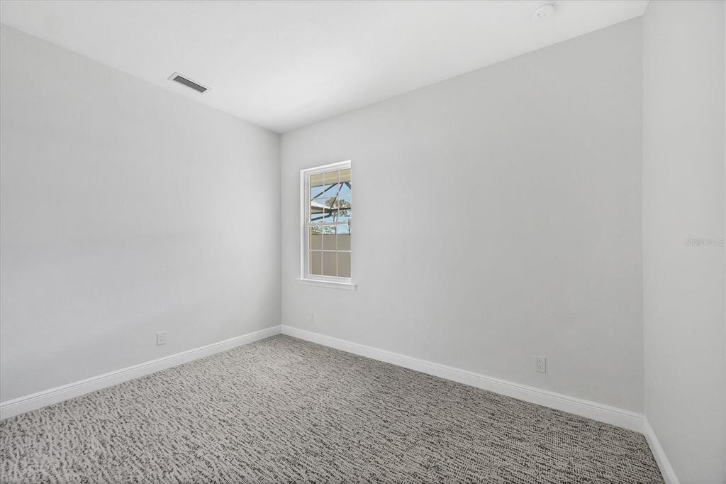 8936 Conch Avenue Placida, FL 33946 - Photo 19 of 39 an empty room with windows