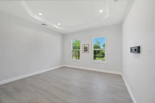 an empty room with windows