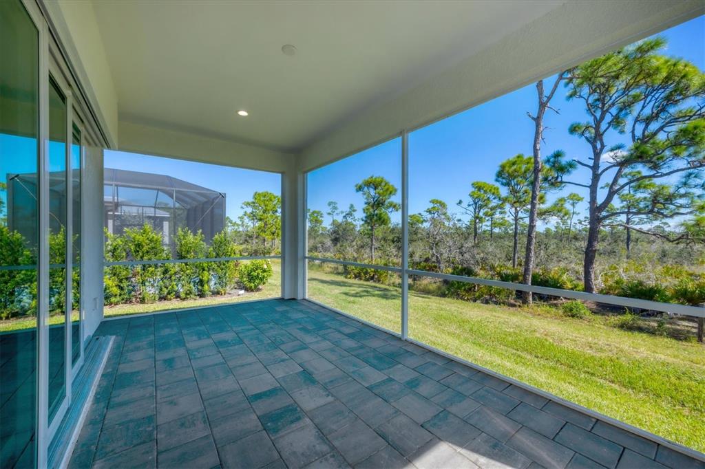 8936 Conch Avenue Placida, FL 33946 - Photo 29 of 39 a view of a house with a yard
