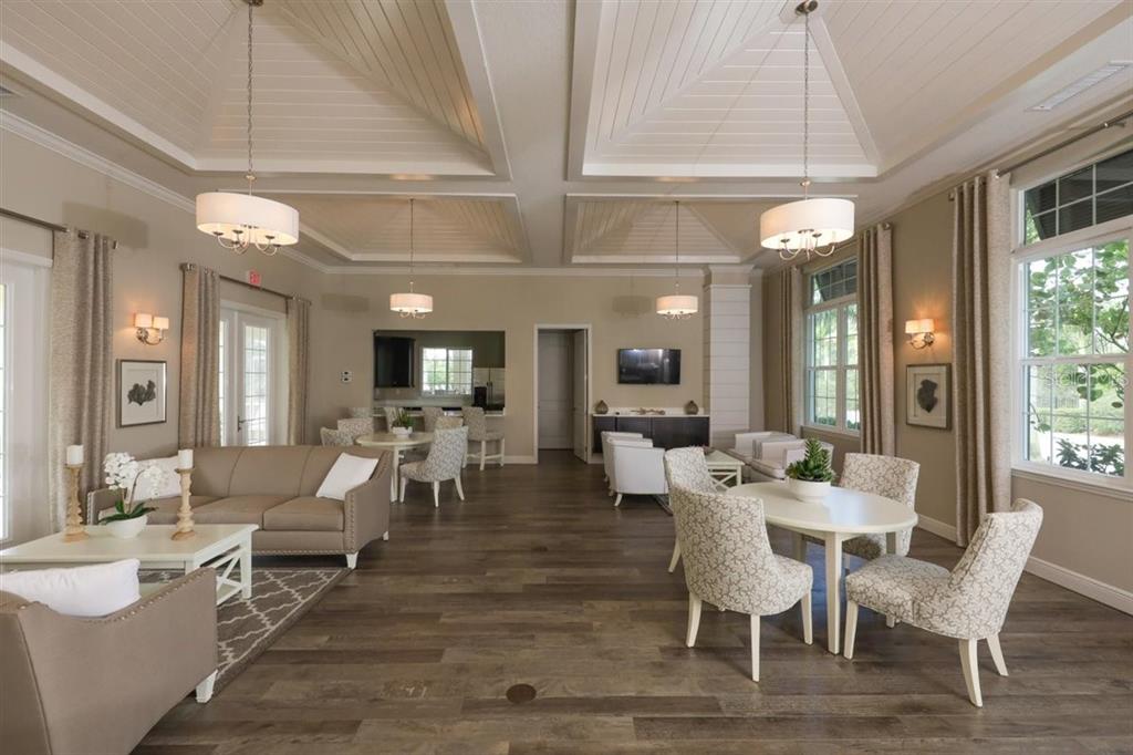 8936 Conch Avenue Placida, FL 33946 - Photo 38 of 39 a view of a dining room with furniture window and wooden floor