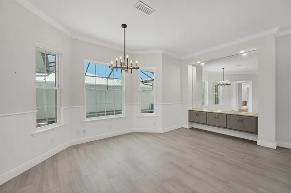 a view of an empty room and window