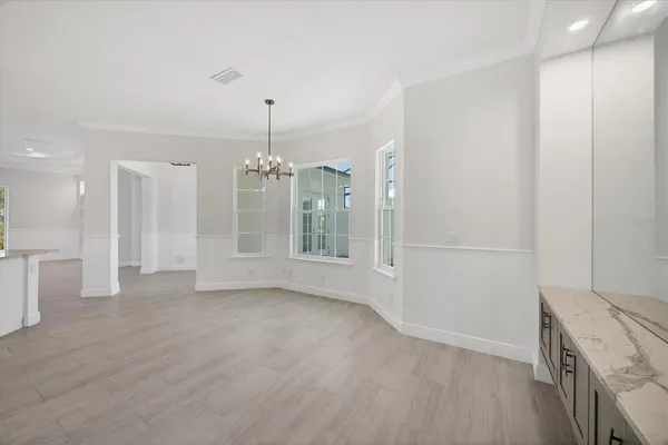 a view of a kitchen with a sink and dishwasher in kitchen