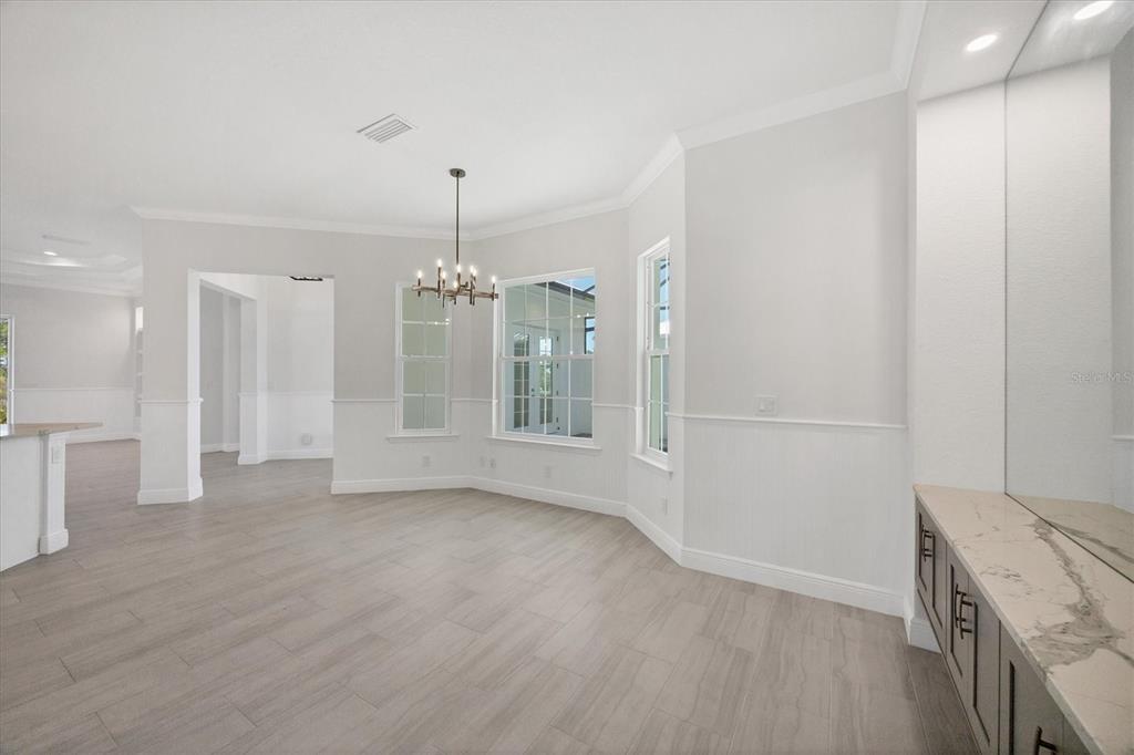8936 Conch Avenue Placida, FL 33946 - Photo 9 of 39 a view of a kitchen with a sink and dishwasher in kitchen