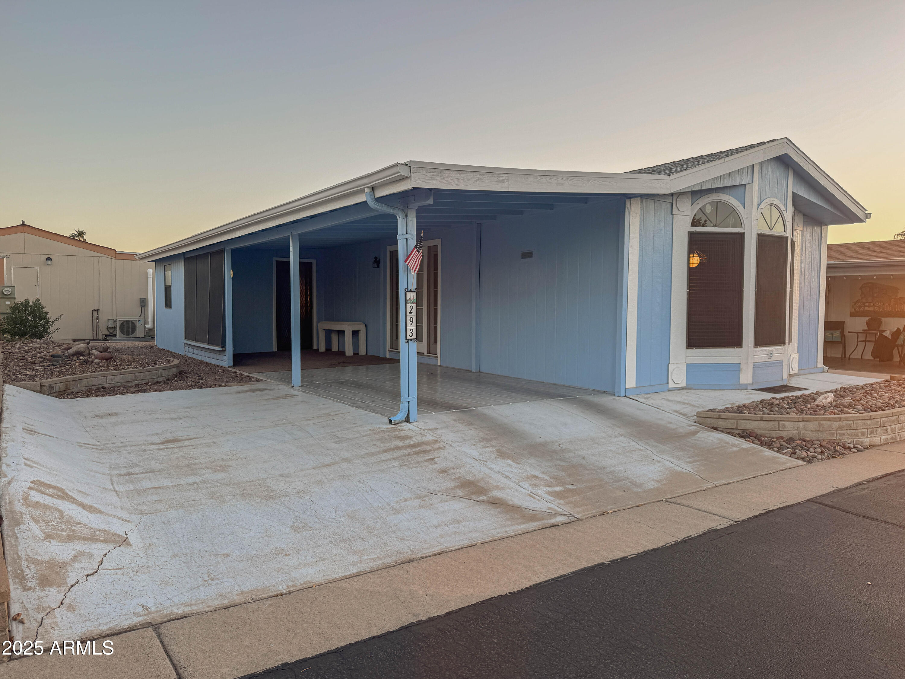 5735 East McDowell Road, Unit 293 Mesa, AZ 85215 - Photo 12 of 40 a view of a house with a space and parking space