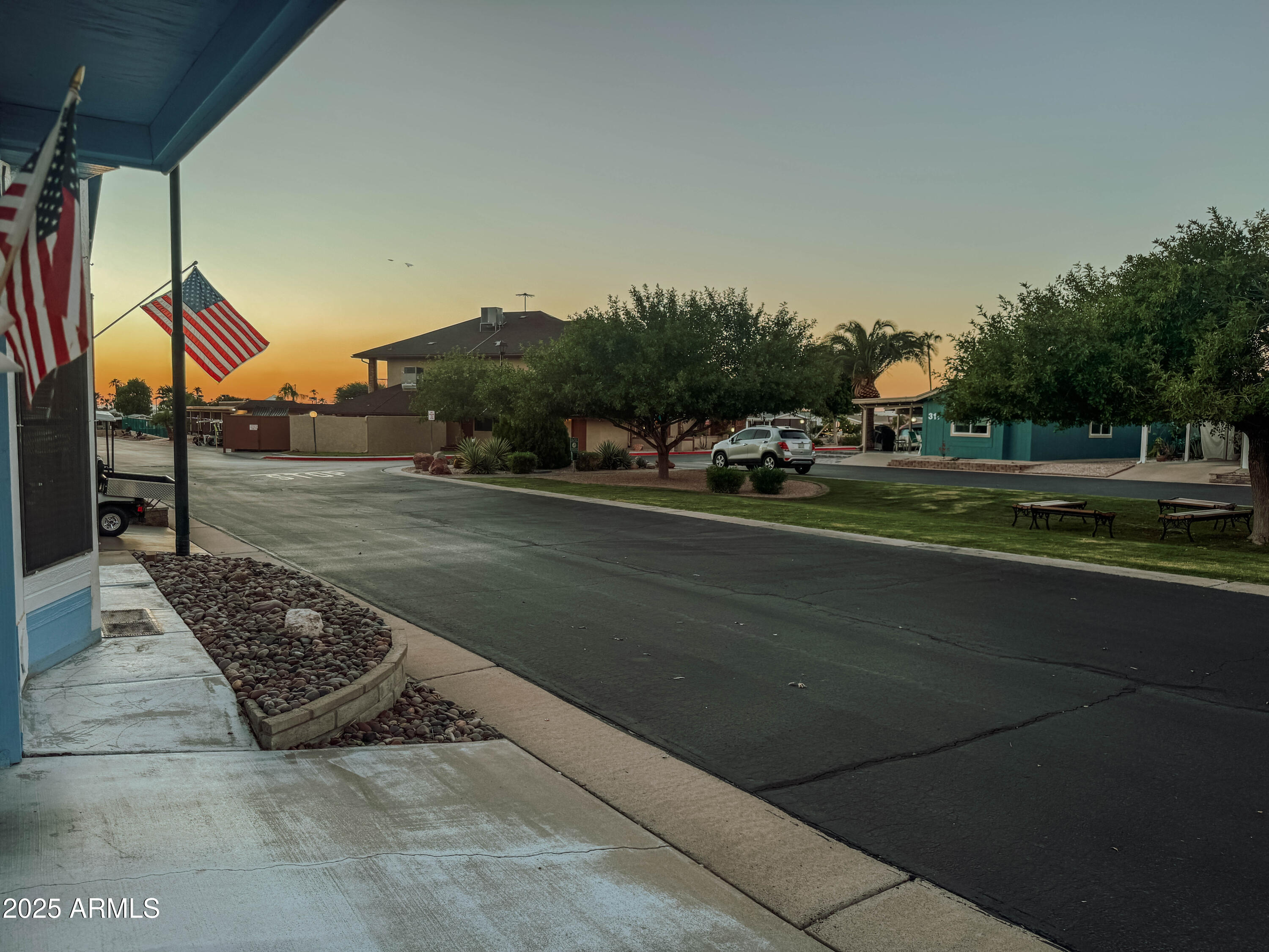 5735 East McDowell Road, Unit 293 Mesa, AZ 85215 - Photo 15 of 40 a view of a street with a building in the background