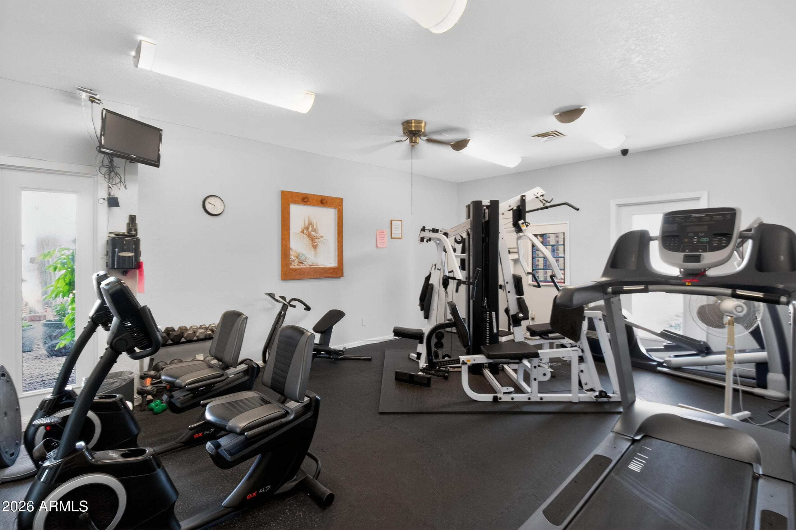 5735 East McDowell Road, Unit 293 Mesa, AZ 85215 - Photo 23 of 40 a view of a room with gym equipment