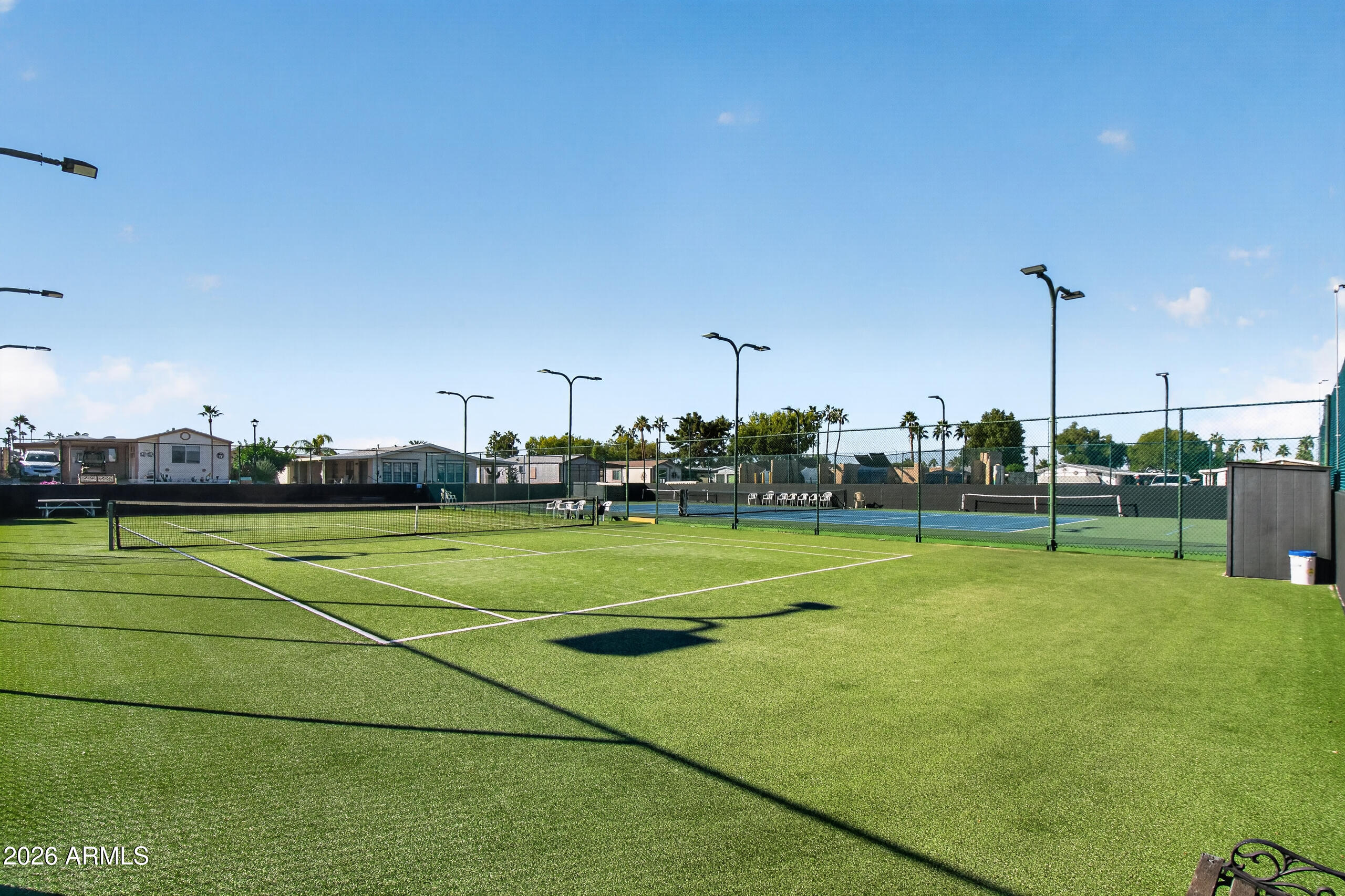 5735 East McDowell Road, Unit 293 Mesa, AZ 85215 - Photo 32 of 40 a view of tennis court