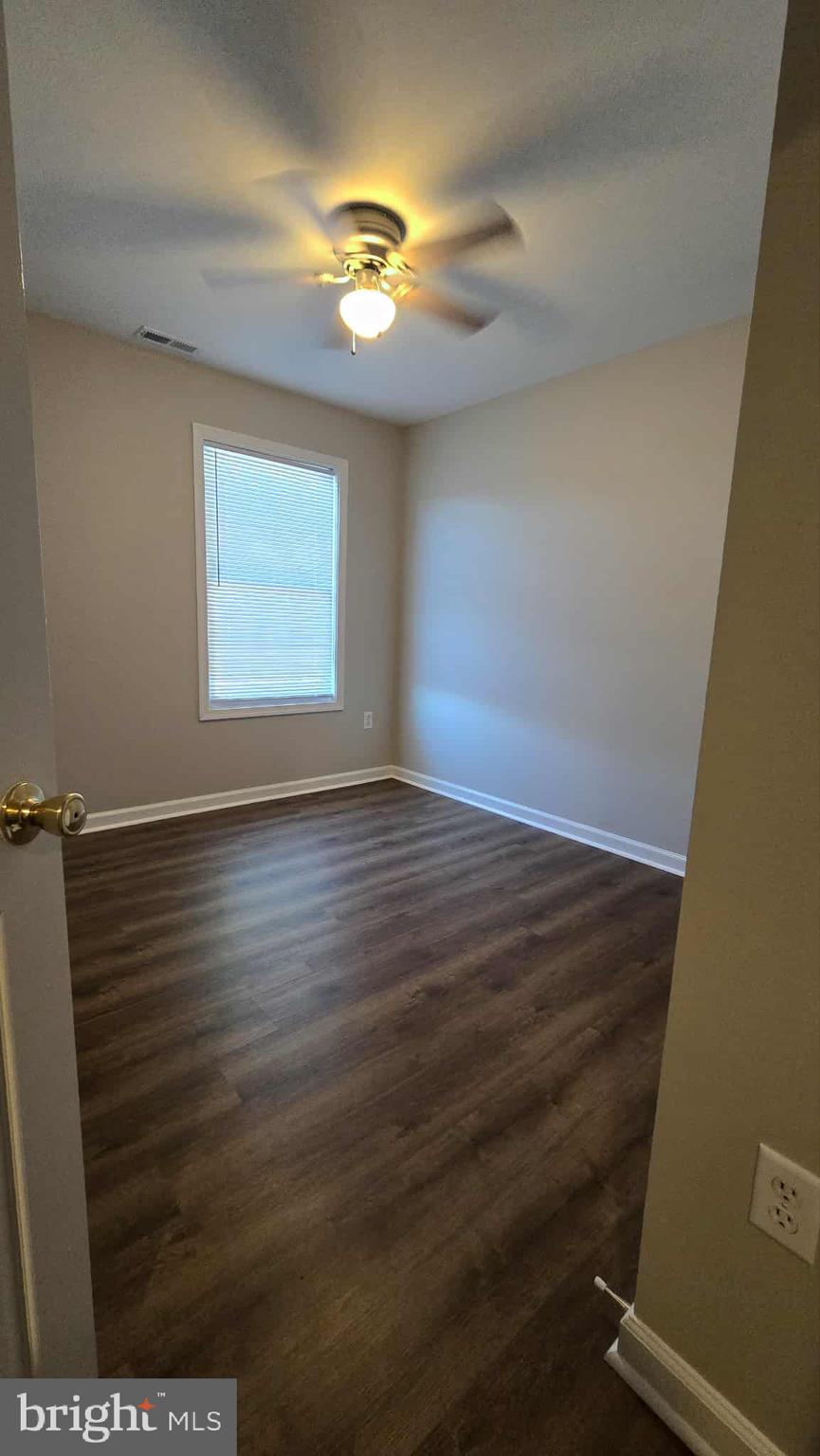 511 National Avenue Winchester, VA 22601 - Photo 2 of 10 wooden floor in an empty room