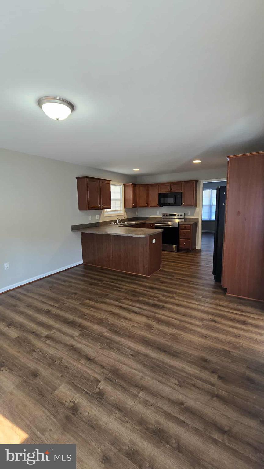 511 National Avenue Winchester, VA 22601 - Photo 4 of 10 a view of kitchen and empty room
