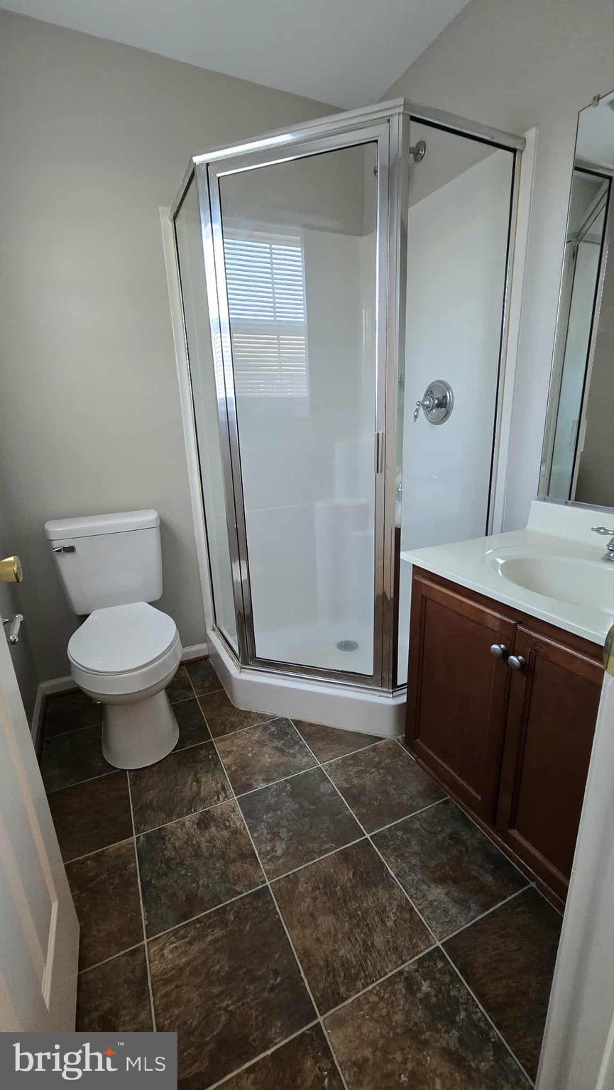 511 National Avenue Winchester, VA 22601 - Photo 8 of 10 a bathroom with a sink toilet and shower