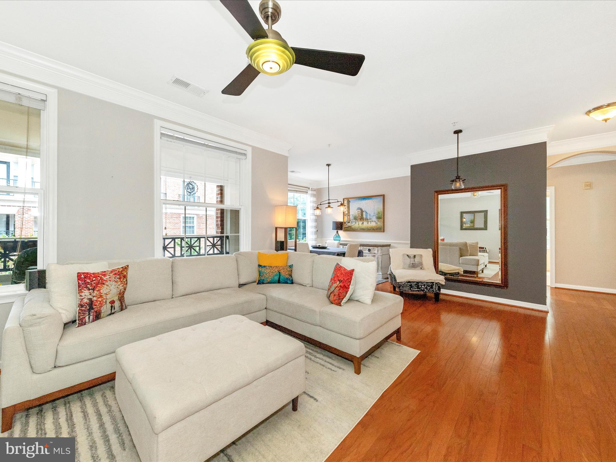 7 Booth Street, Unit 201 Gaithersburg, MD 20878 - Photo 2 of 67 a living room with furniture and wooden floor