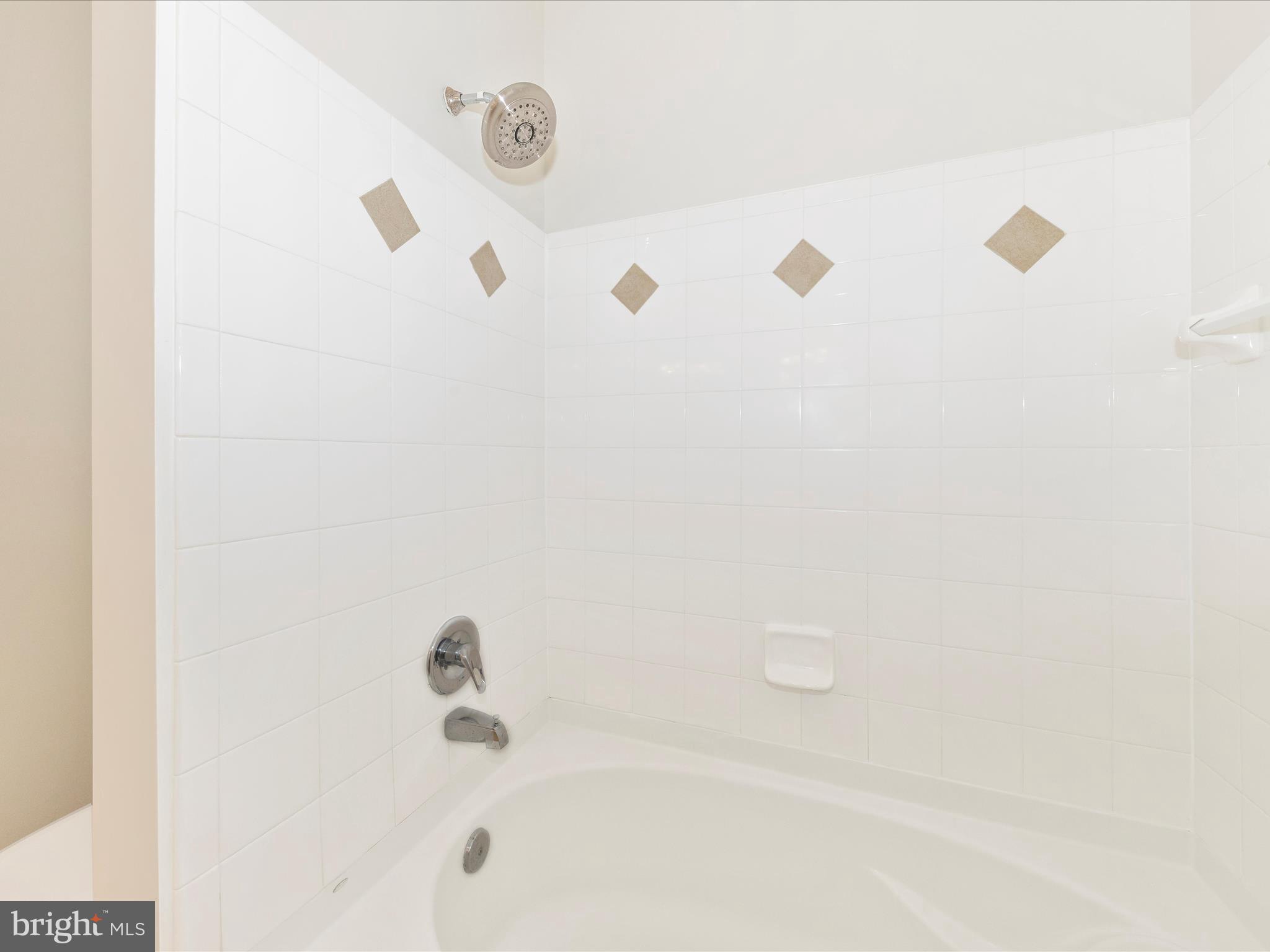 7 Booth Street, Unit 201 Gaithersburg, MD 20878 - Photo 21 of 67 a bathroom with a shower