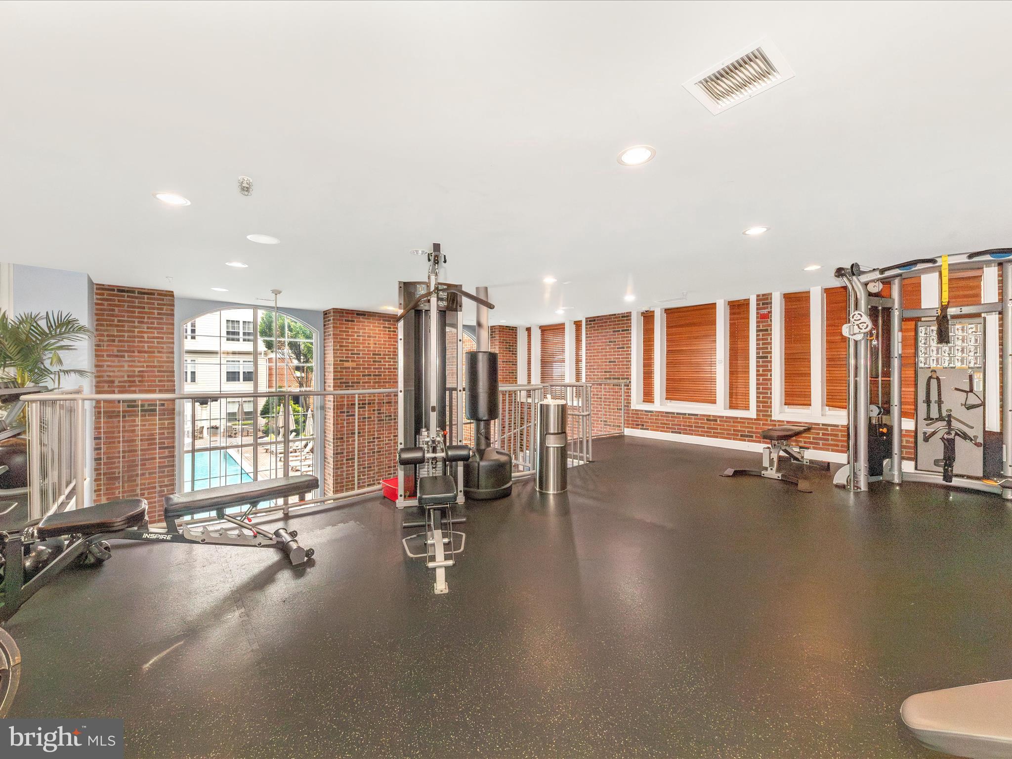 7 Booth Street, Unit 201 Gaithersburg, MD 20878 - Photo 35 of 67 a view of a room with gym equipment