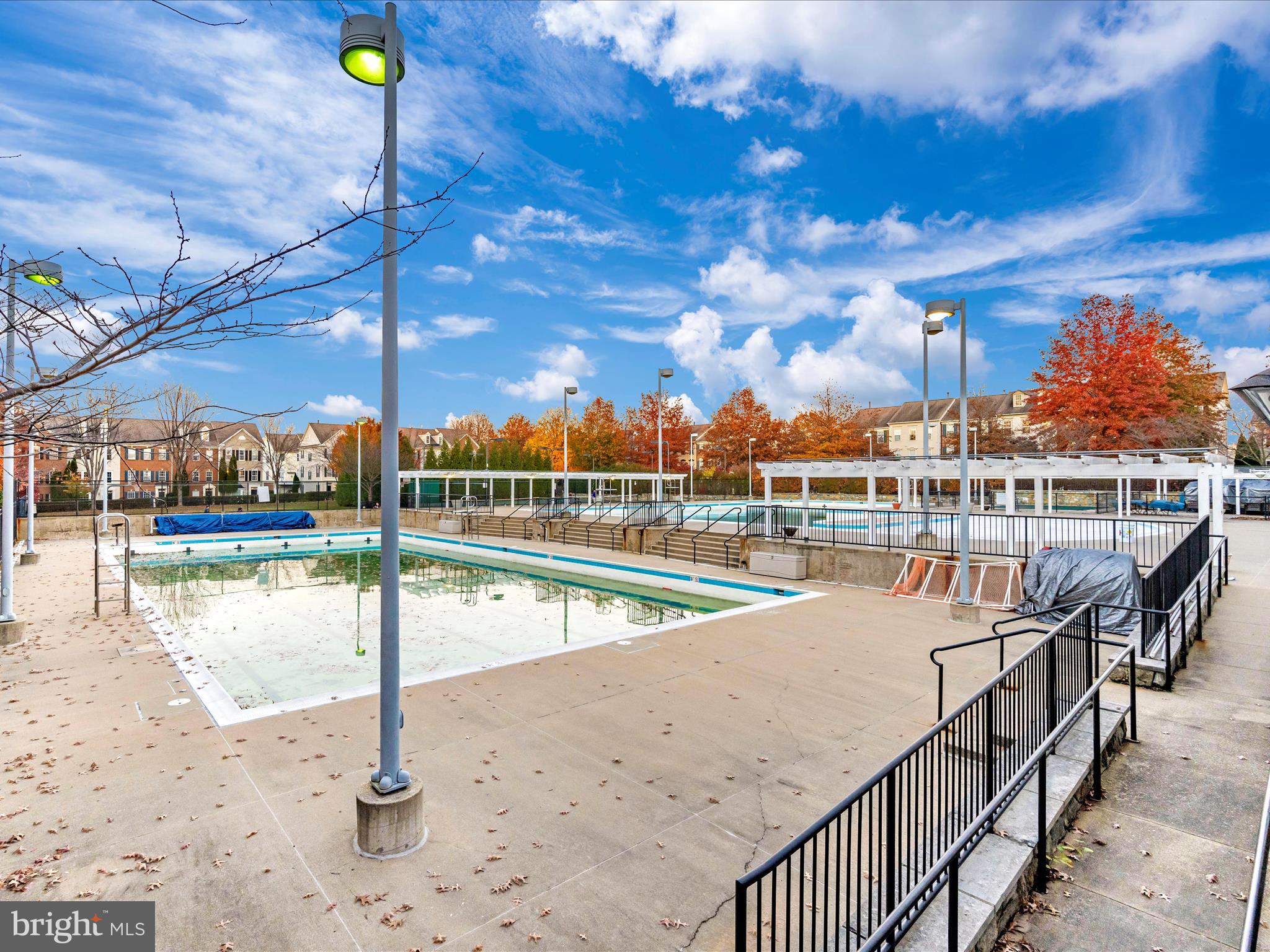 7 Booth Street, Unit 201 Gaithersburg, MD 20878 - Photo 60 of 67 a view of a swimming pool with a patio