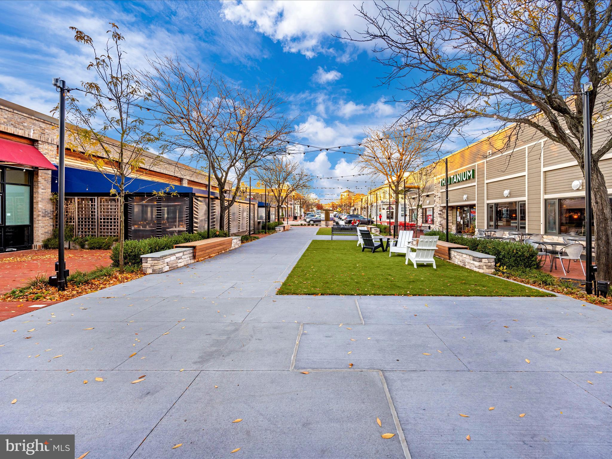 7 Booth Street, Unit 201 Gaithersburg, MD 20878 - Photo 66 of 67 a view of yard with swimming pool and furniture