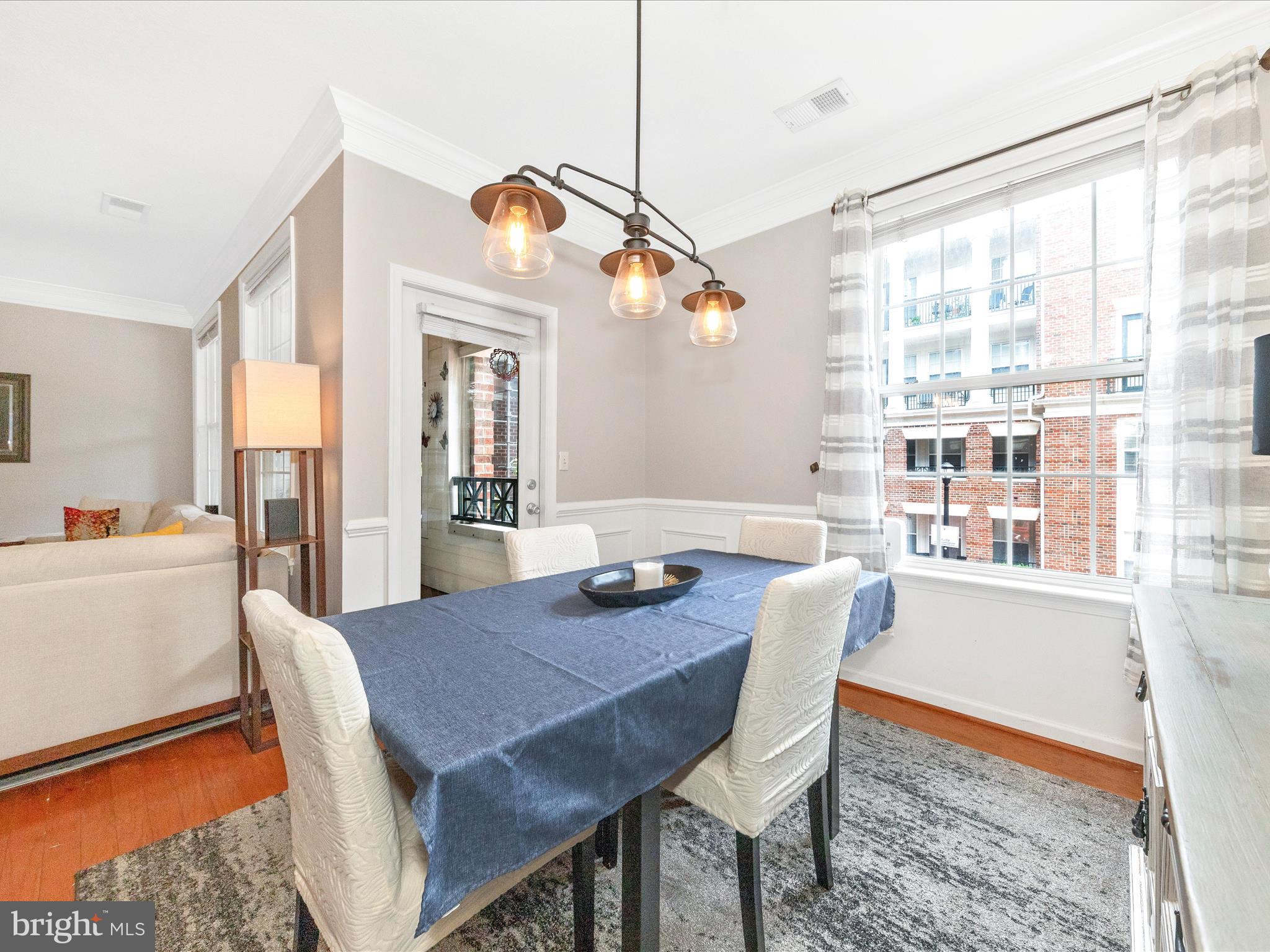 7 Booth Street, Unit 201 Gaithersburg, MD 20878 - Photo 7 of 67 a dining room with furniture and window