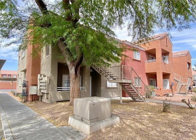 4730 East Craig Road, Unit 2093 Las Vegas, NV 89115 - Photo 2 of 10 View of property featuring stairs