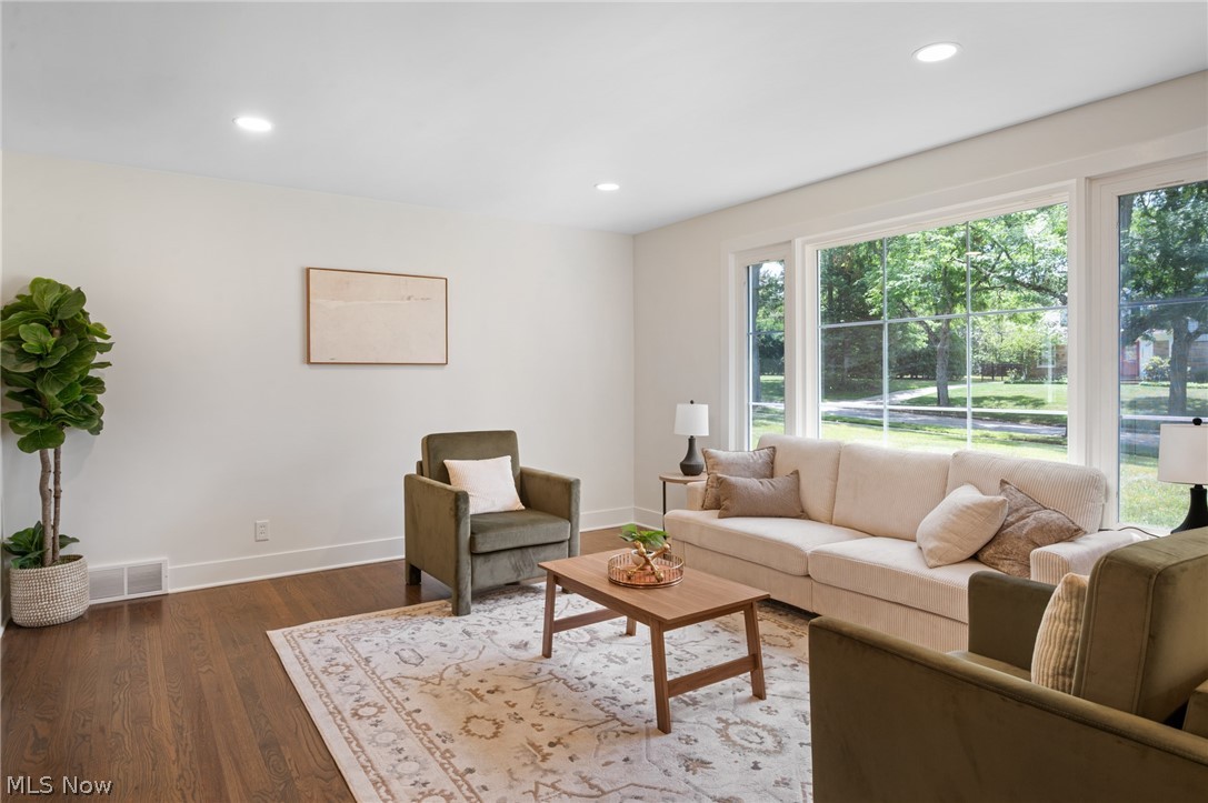 22625 Rye Road Shaker Heights, OH 44122 - Photo 5 of 38 Spacious living area featuring large picture windows, wood-finish flooring, recessed lighting, and crisp white baseboards
