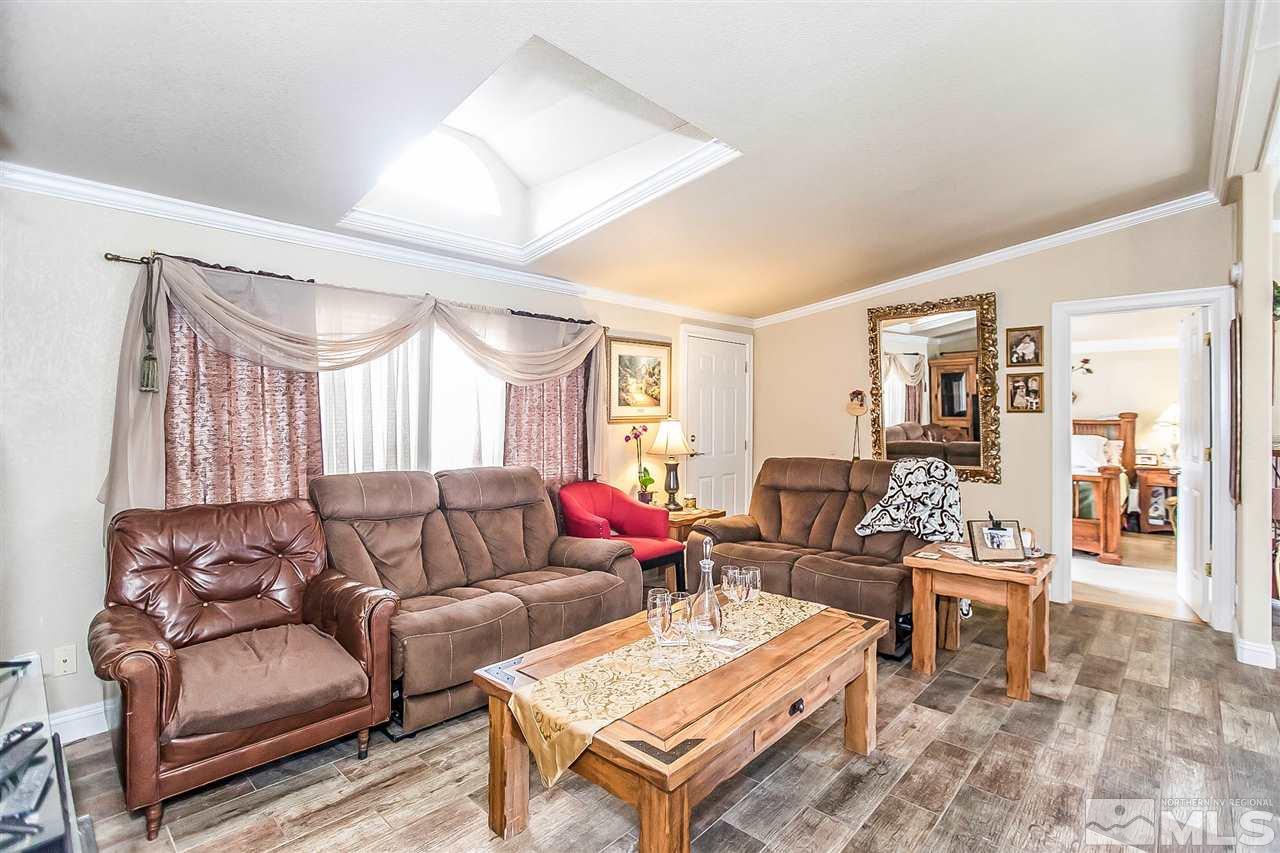 2735 Snapdragon Way Reno, NV 89512 - Photo 8 of 18 a living room with furniture and wooden floor