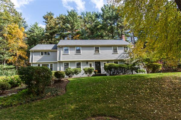 55 Kings Grant Road Weston, MA 02493 - Photo 1 of 1 a front view of a house with a garden