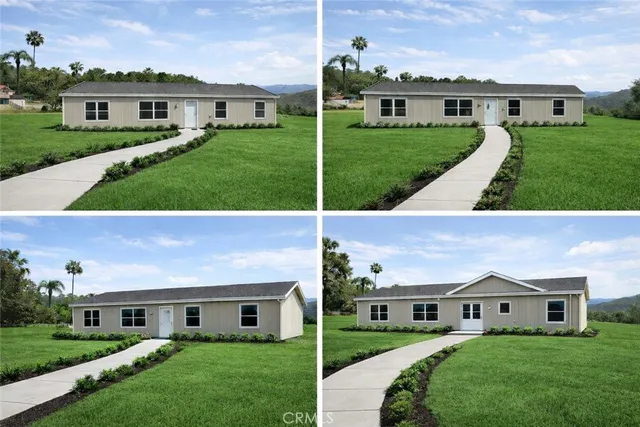 a view of house with a yard