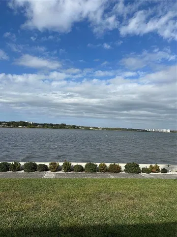 a view of a lake with a city view