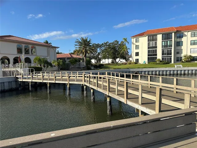 a view of a swimming pool with a deck
