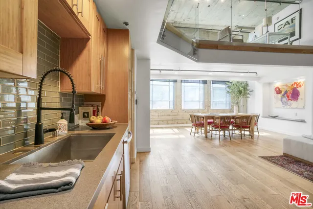 a very nice looking living room with a large window