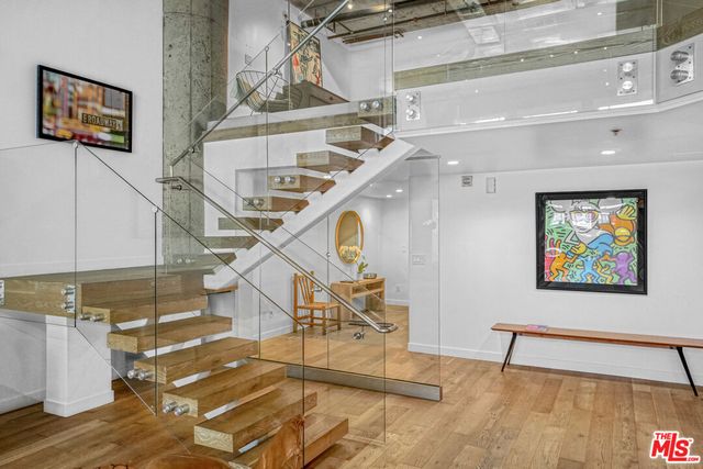 a view of a living room and entry way