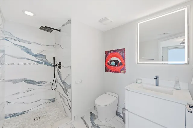 a view of a entryway with a flower in a living room