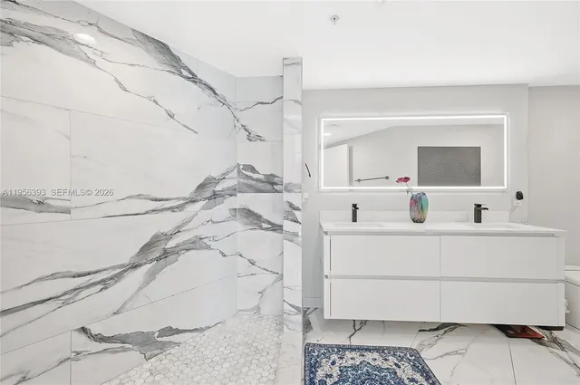 a swimming pool with outdoor seating and wooden floor