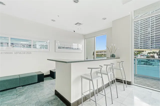 a view of a balcony with lake view and mountain view