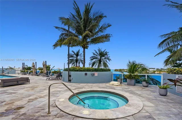a view of a balcony with furniture