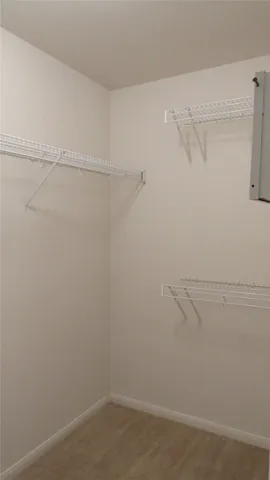 a view of small space with racks on the wall