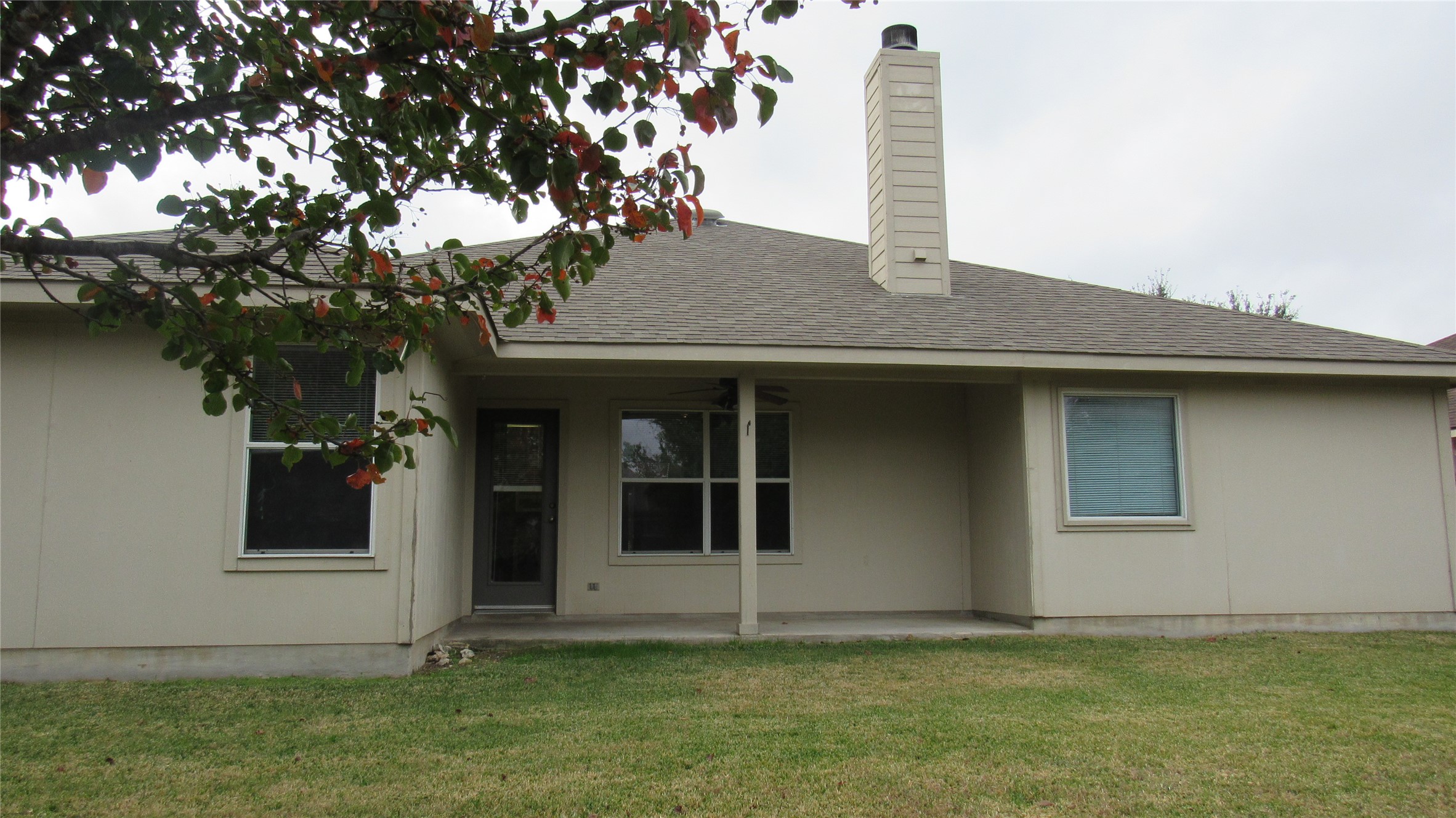 1510 Ridgewood Drive Leander, TX 78641 - Photo 18 of 19 a house with a tree in the background