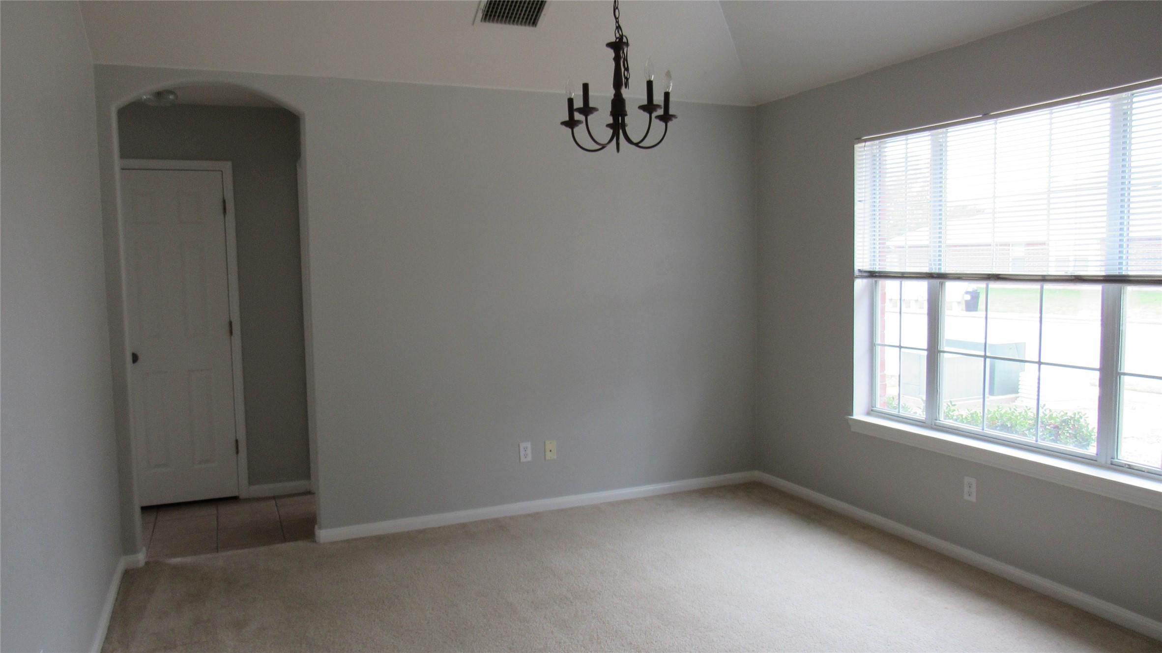 1510 Ridgewood Drive Leander, TX 78641 - Photo 9 of 19 a view of an empty room with a window