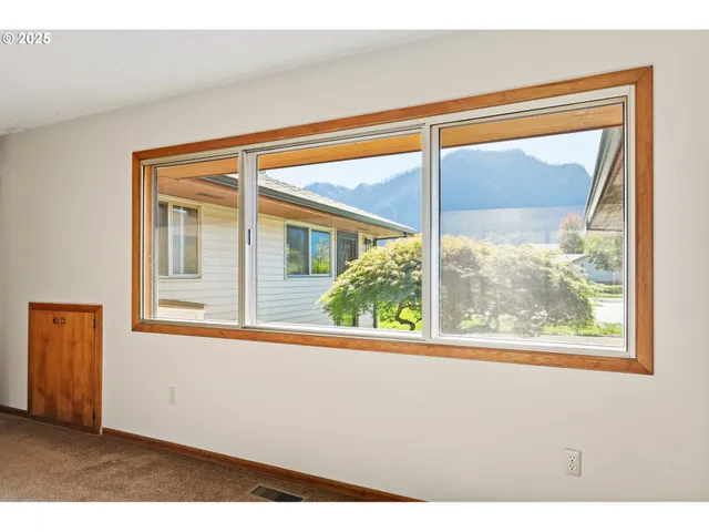 a view of a door and a window