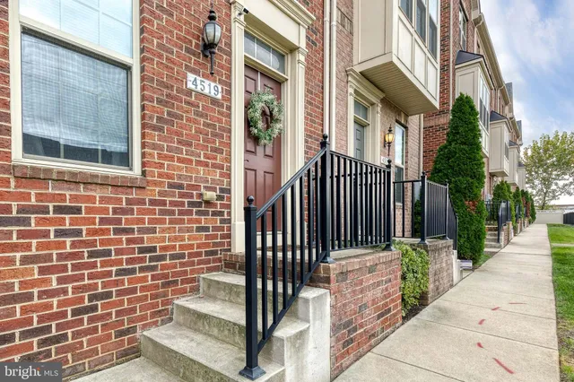 a view of a brick wall of the building