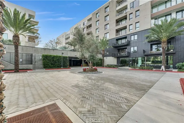 a view of a building with a street