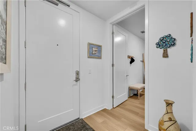 a bathroom with a sink and glass door