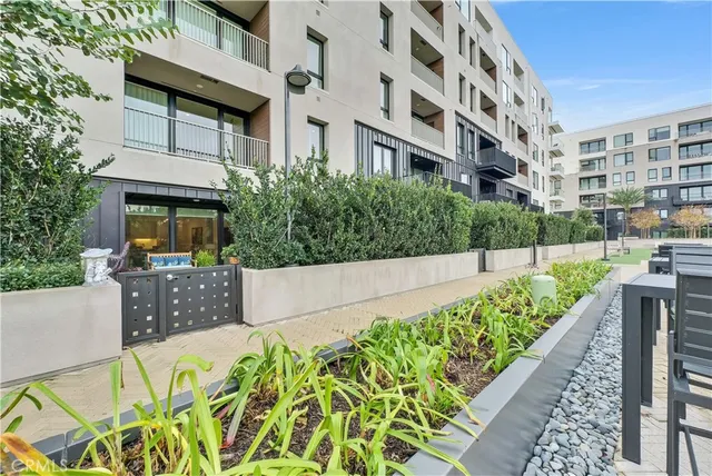 a view of a building with a garden