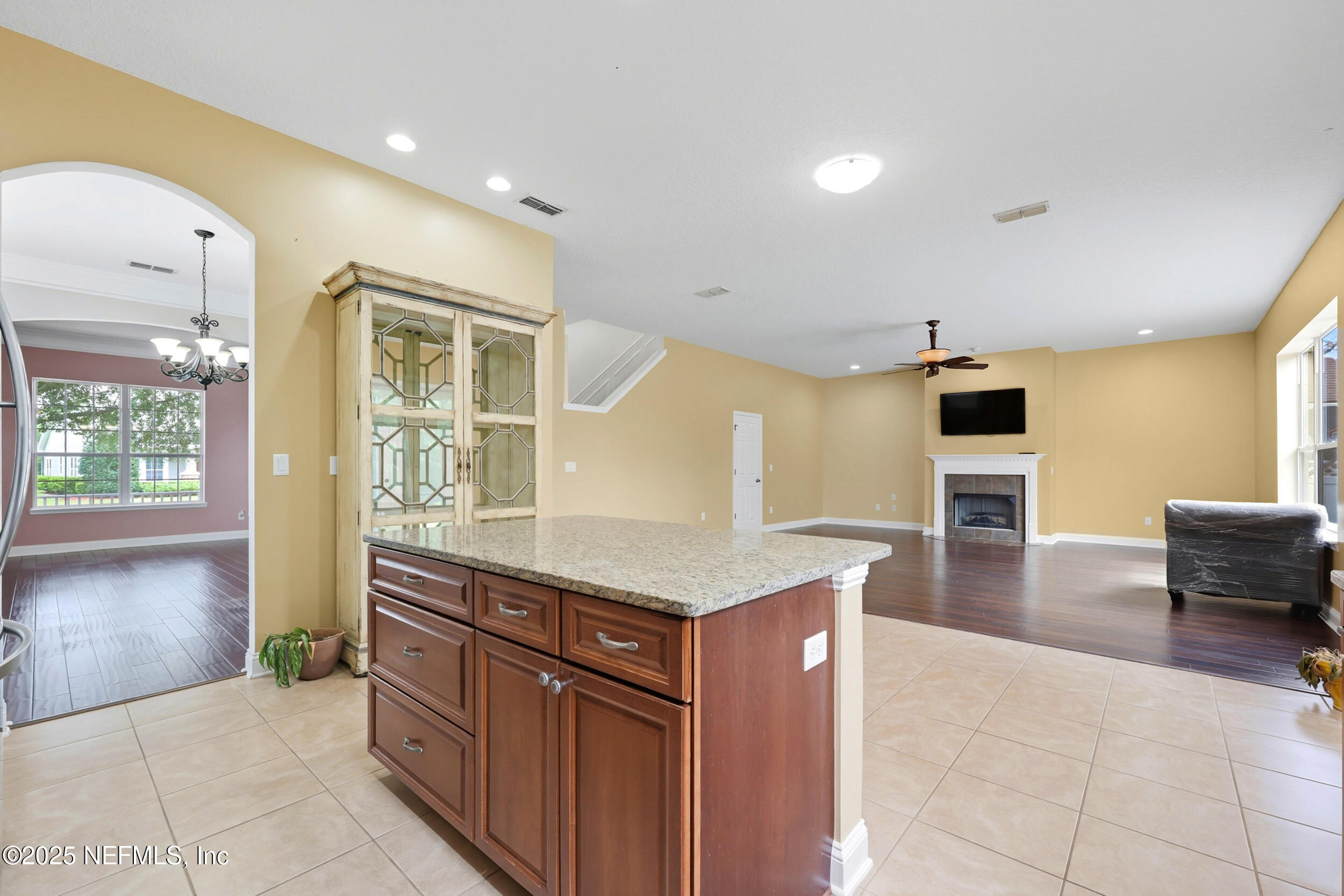 105 Castlegate Lane St. Johns, FL 32259 - Photo 13 of 45 a kitchen with stainless steel appliances granite countertop a refrigerator and a stove