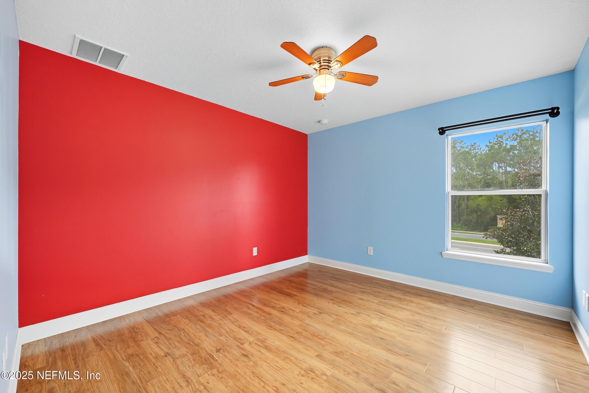 105 Castlegate Lane St. Johns, FL 32259 - Photo 27 of 45 a view of a big room with windows