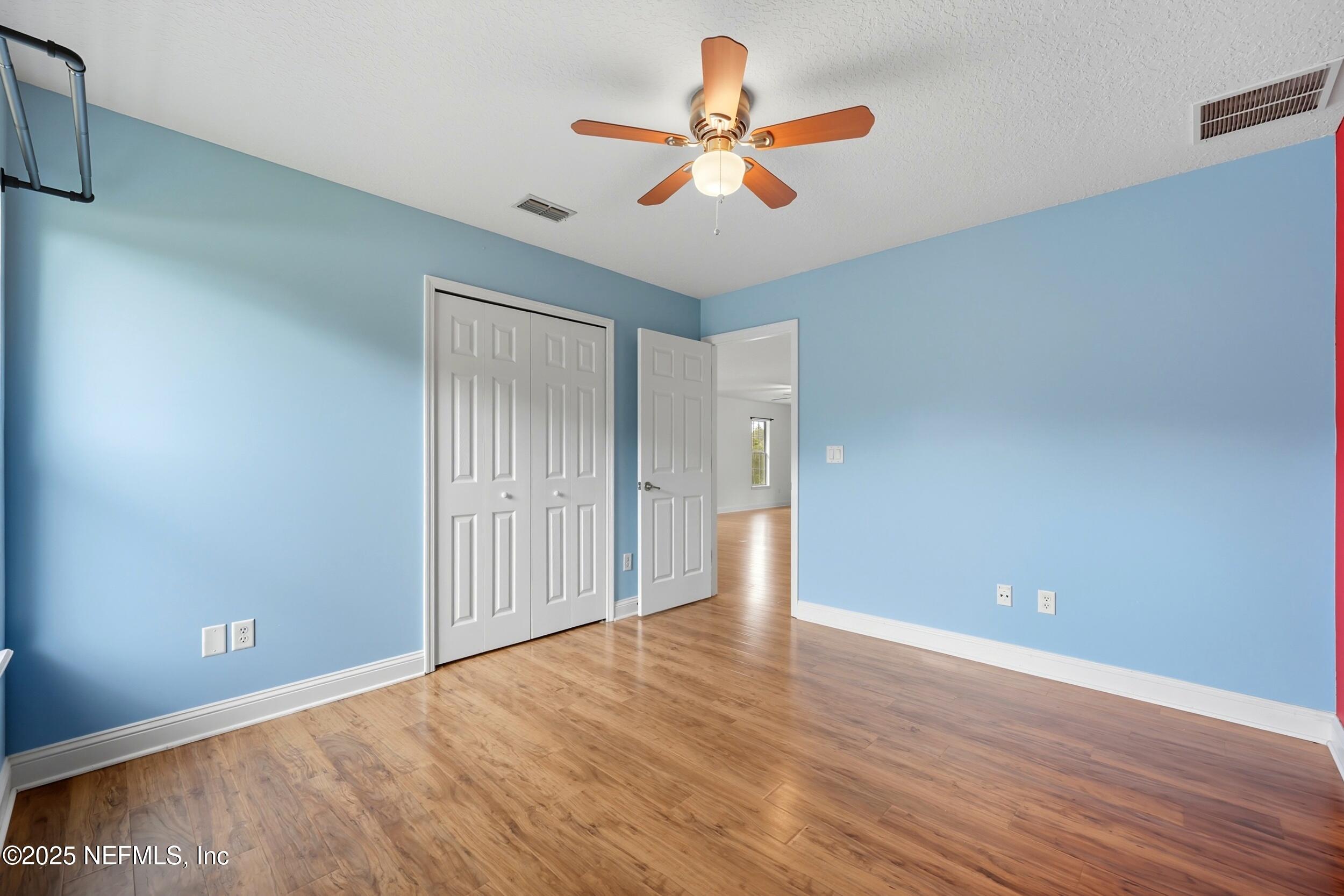 105 Castlegate Lane St. Johns, FL 32259 - Photo 28 of 45 wooden floor in an empty room