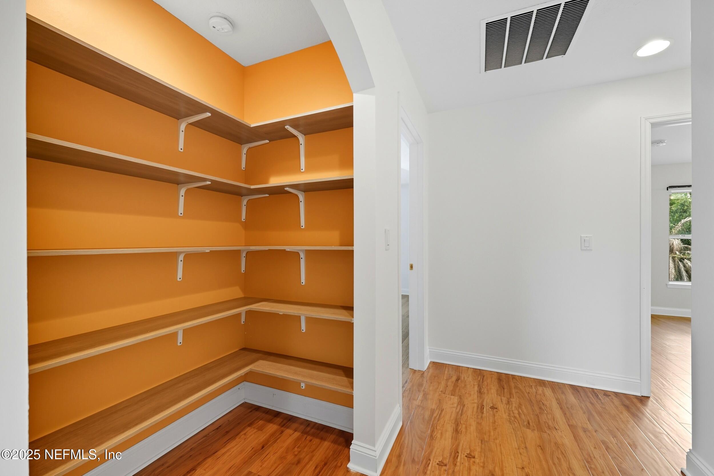 105 Castlegate Lane St. Johns, FL 32259 - Photo 31 of 45 a view of walk in closet with empty racks