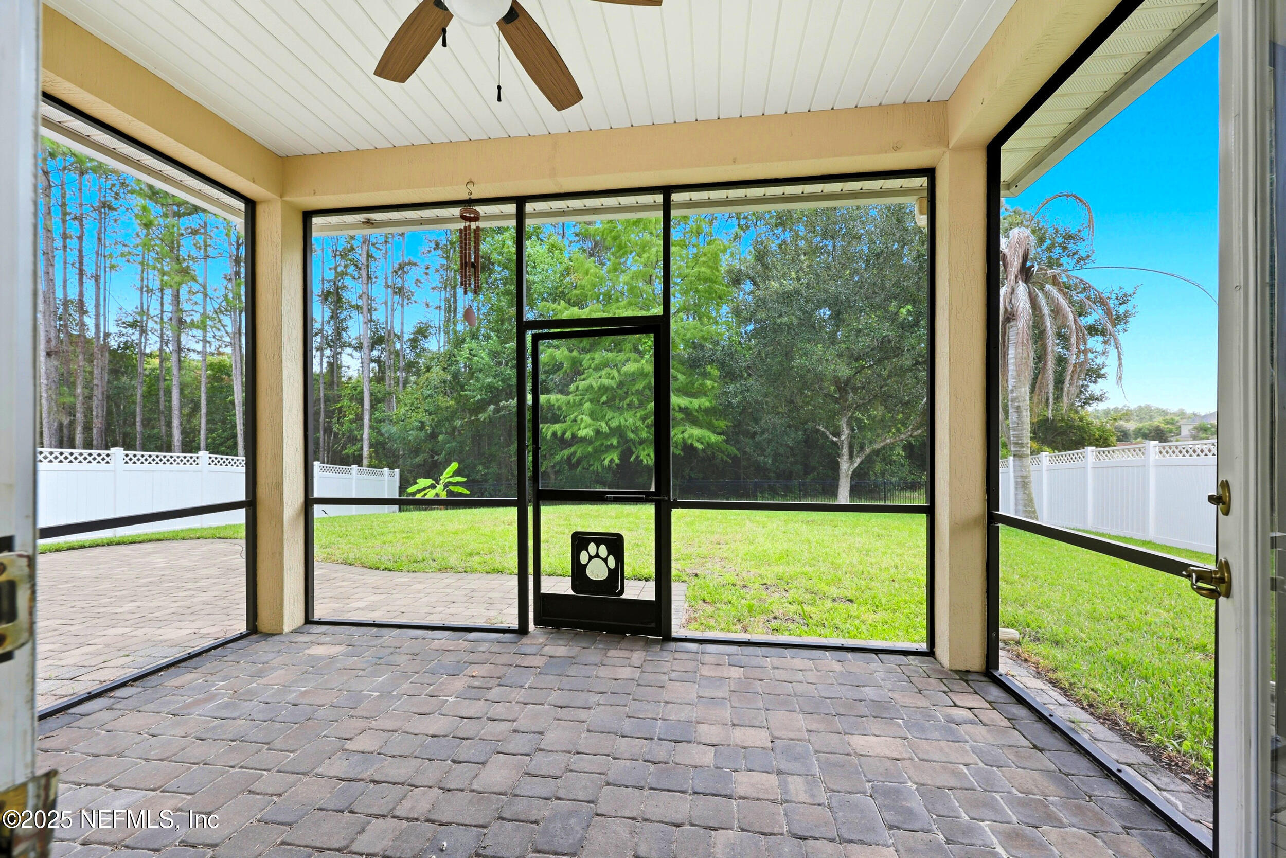 105 Castlegate Lane St. Johns, FL 32259 - Photo 39 of 45 a view of an entryway with a garden